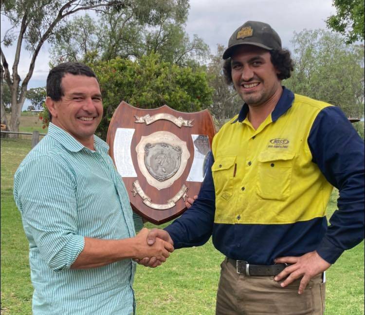 Top honour: Inverell president Ross Fuller (left) presents Highlanders skipper Luther Robinson with the Treloar Shield for the Central North best and fairest. Photo: Inverell Highlanders Rugby Union Facebook.