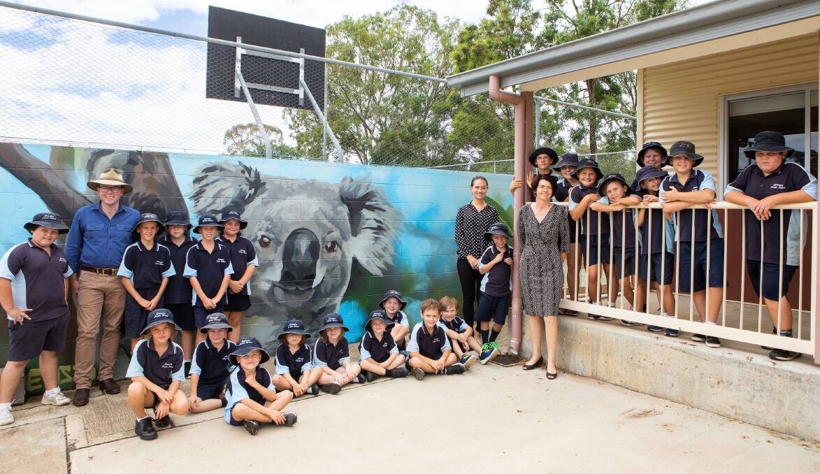RESCUERS: Northern Tablelands MP Adam Marshall, left, Delungra Public School infants teacher Sarah Dawson and principal Toni Withers with students all excited to soon begin their koala rescue plan. Photo: supplied.