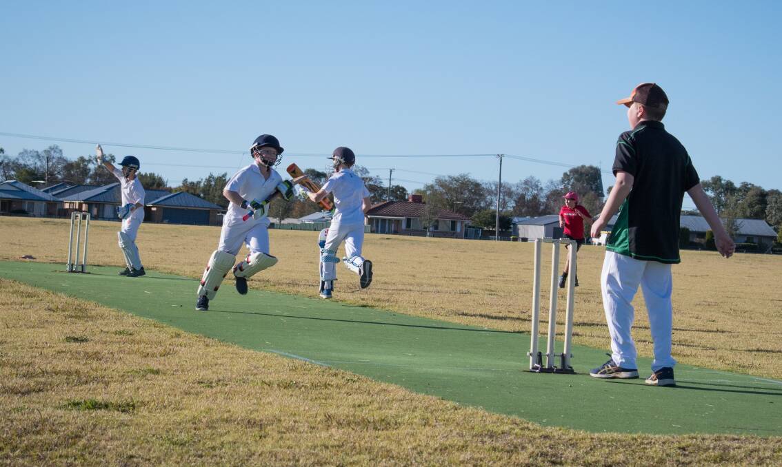 Inverell junior cricketers go through some running between the wickets drills during the representative team trials over the weekend. Photo: supplied.