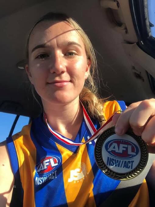 Kyla Hamilton won the best and fairest award for the youth girls team. Photo: AFL North West.