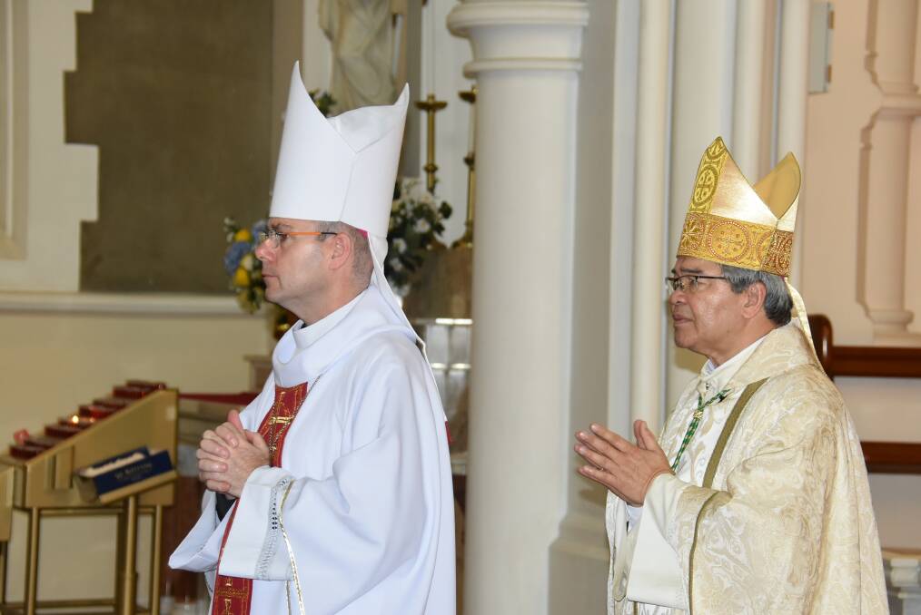 BISHOPS: Diocese of Armidale Bishop Michael Kennedy and apostolic nuncio Archbishop Adolfo Tito Yllana. Photo: Nicholas Fuller.