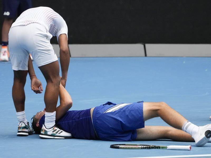 Jakub Mensik collapsed on court after losing to Bruno Kazuhara in the Australian Open boys' final.