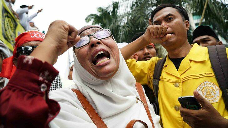 JAKARTA, INDONESIA - MAY 9: Indonesian Muslim Cry after the judge has sentenced the 2 year sentence to ahok in Jakarta, Indonesia, on May 9, 2017. . Photo: Jefri Tarigan