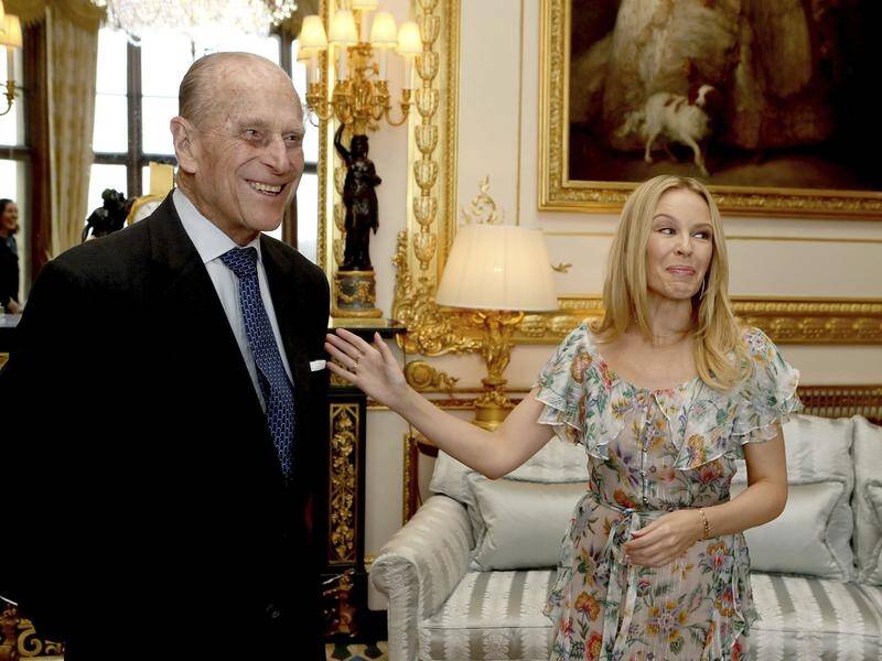 Prince Philip presented Kylie Minogue with the Britain-Australia Society Award in April 2017.