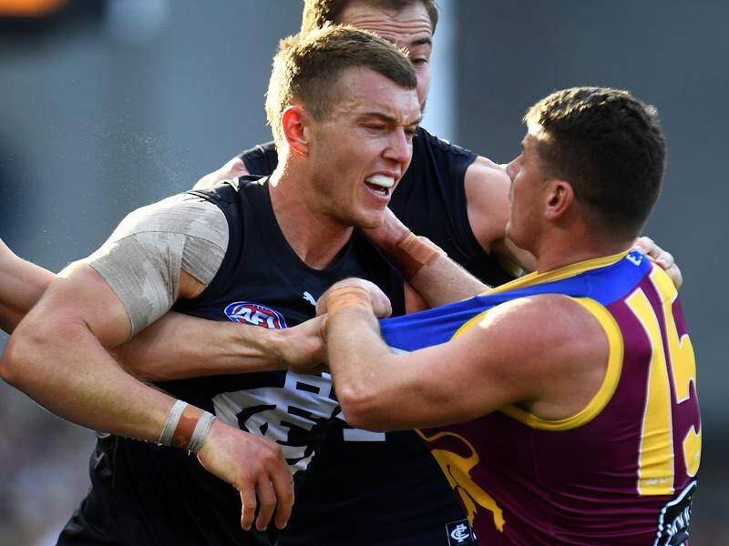 Carlton plan to appeal the two-game ban Patrick Cripps (l) copped from the clash against Brisbane. (Jono Searle/AAP PHOTOS)