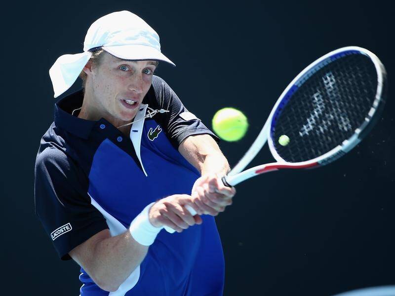 Wildcard Marc Polmans has claimed the biggest win of his career at the Australian Open.