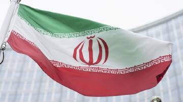 Iranian TV reports Revolutionary Guards have detained several foreigners.