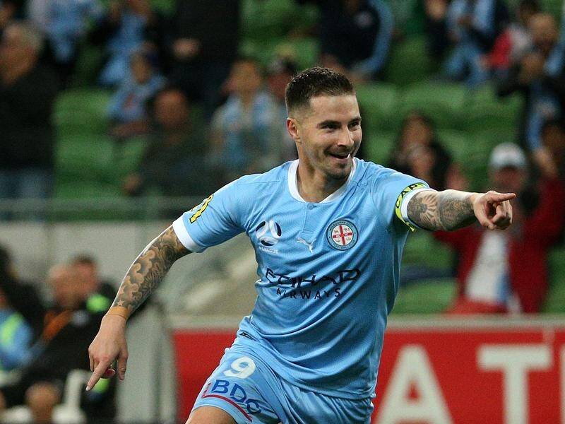 Jamie Maclaren celebrates Melbourne City's fifth goal - and the third of his five - against Victory.