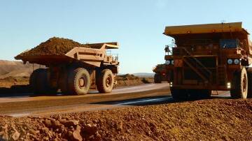 Volatility in commodity prices has implictions for the federal budget, the treasurer says.