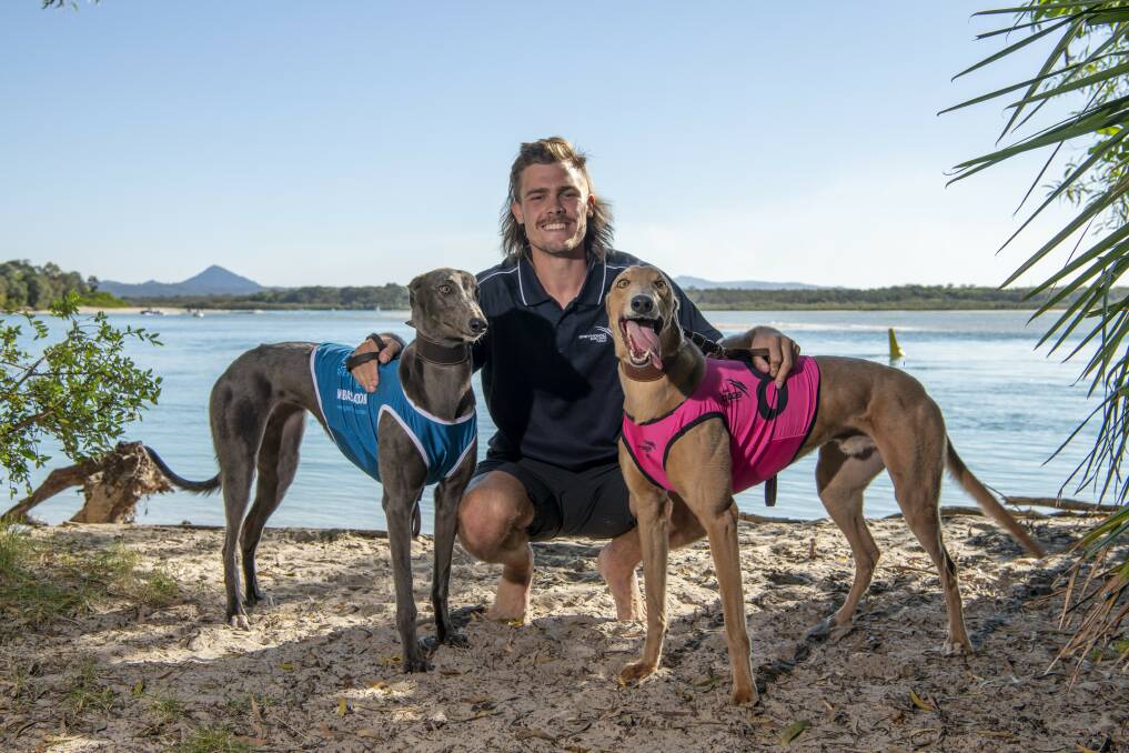 AMBASSADOR: NRL star Ryan Papenhuyzen with some of the faces of Greyhound Racing NSW. Photo: Michael McInally.