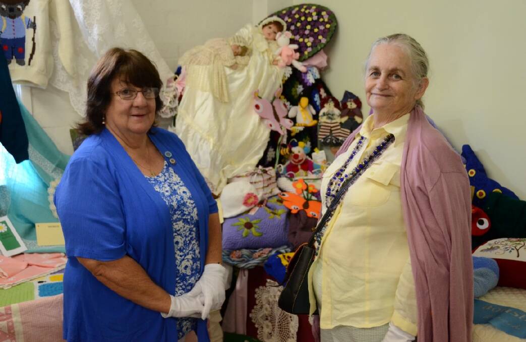 HANDICRAFT: Lanna Hockley and Rosemary Harris proudly present their Warialda branch display. Photo by Renate Moerman No 6