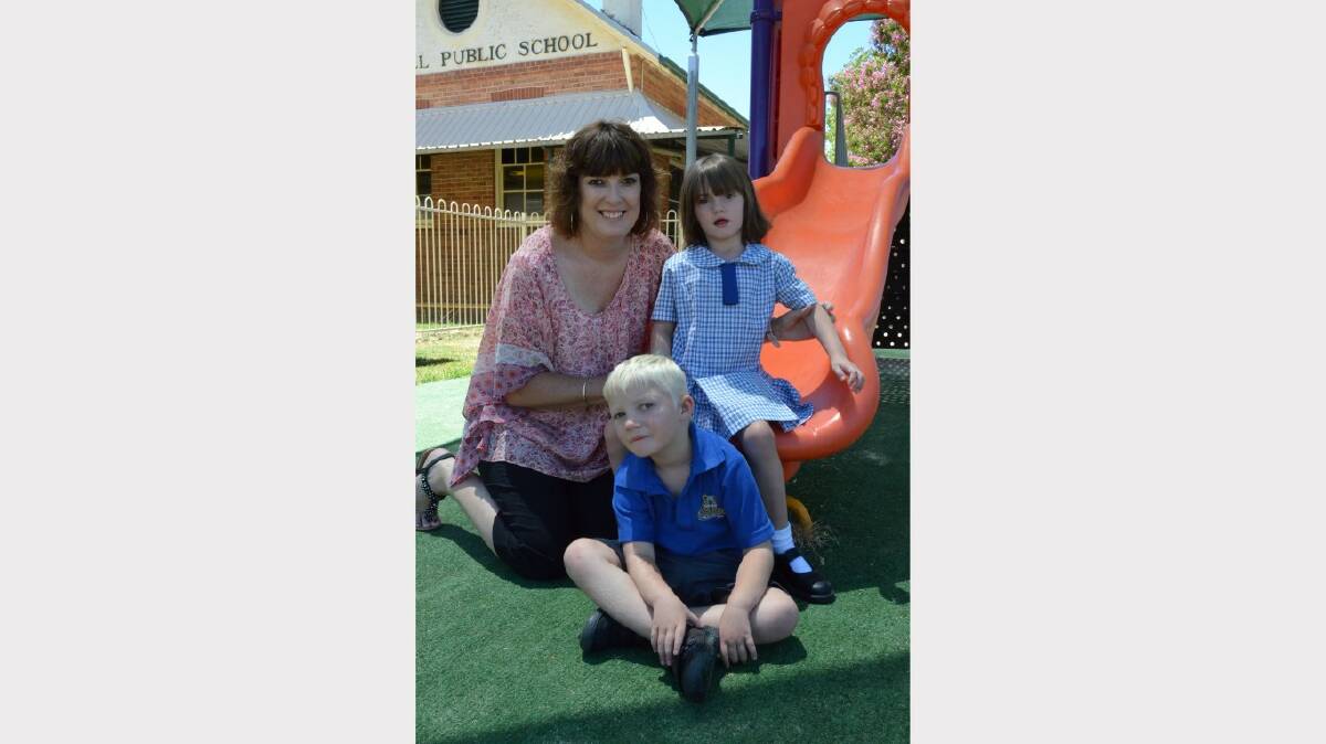 Ross Hill Public School: K-6J SUPPORT UNIT Mrs Debbie Johns with Resheena
Gregory on the slippery slide and Jordon Walker sitting in the front. Photo by Inverell Times Feb 2014.