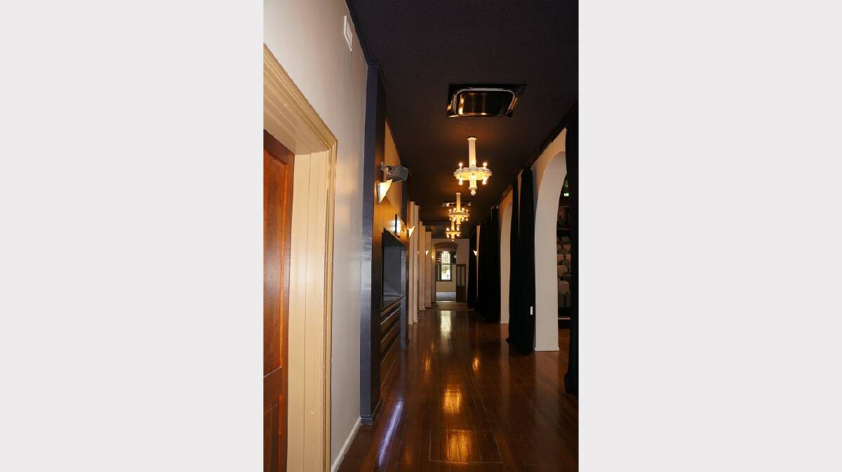 A view of the hallway with light fixtures from the old Inverell Capitol Theatre. Photos by Michele Jedlicka No 2.