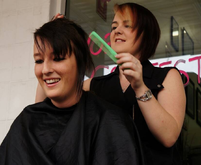 HAIR LOSING EXPERIENCE: Jessica Spalding has her hair cut by Bec Erenshaw.
