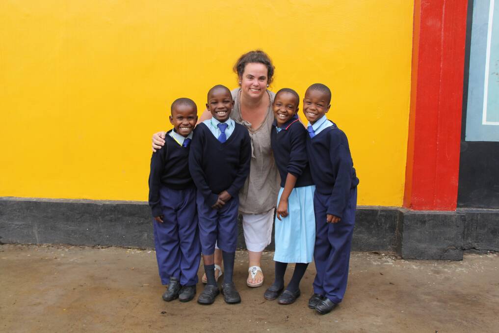 FIRST CLASS: Gemma Sisia with some of her outstanding students at St Jude's. 
Photo contributed by St Jude's