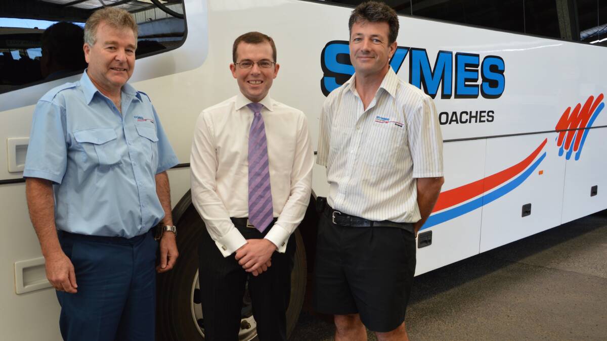 Symes Coaches owner Greg Symes, left, pictured with Member for Northern Tablelands Adam Marshall and manager Mal Whitton.