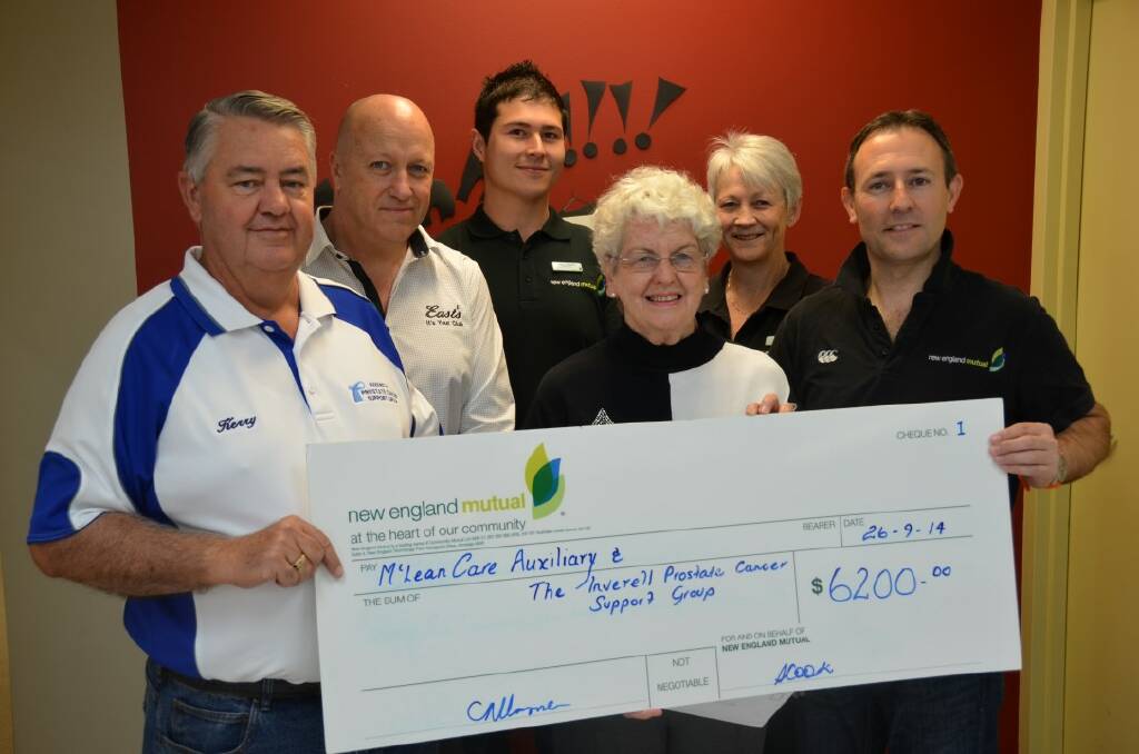 CHEQUE HANDOVER: Inverell Prostate Support Group president Kerry White, bowls club manager Scott Langley, New England Mutual manager Alex Ribeiro, Pam Gowlett from McLean Care Ladies Auxiliary, and event organisers Craig Horner Sandy Cook.