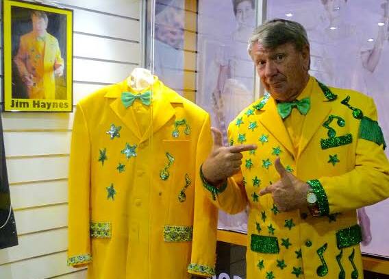 Jim Haynes with his original iconic green and gold suit, which now lives in the ACMF museum.