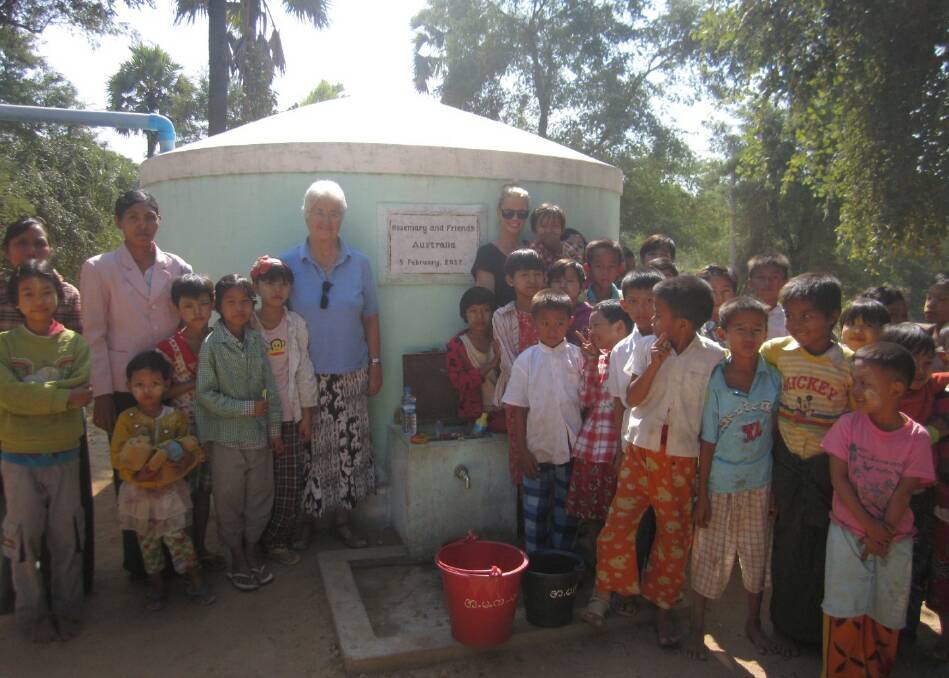 Many grateful schoolchildren gather at a two year old tank made possible by Rosemary and some anonymous donors.