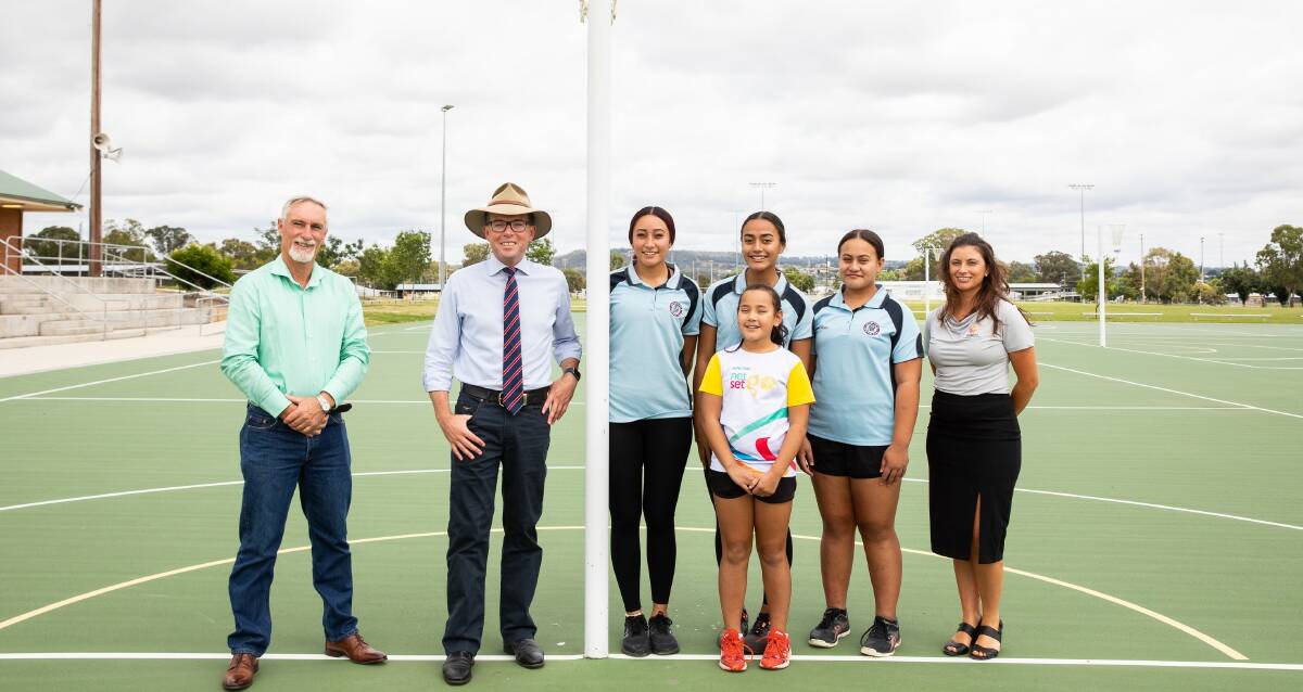 ON COURT: Two of Inverells netball courts will be upgraded thanks to a new funding grant, pictured is mayor Paul Harmon (left), Northern Tablelands MP Adam Marshall, Inverell netballers Alexia Wineti, Bria Wineti, Georgie Wineti and Malia Wineti and Inverell Netball Association vice-president Carly McMahon. Photo: Supplied