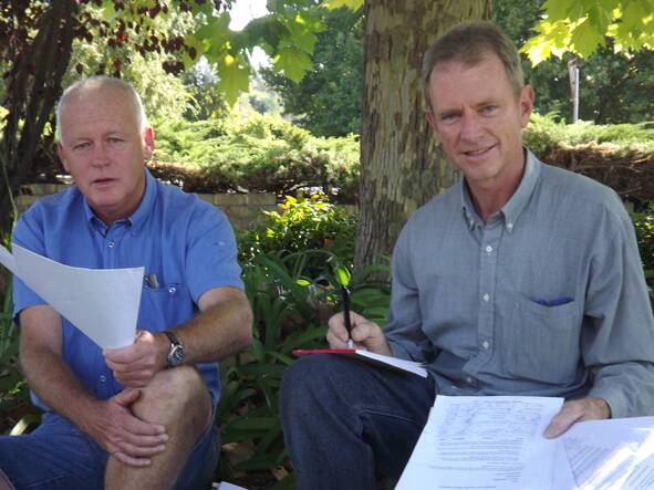 Tony Sonter and Garry Newley with some of the petitions yesterday. 