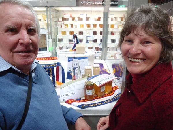 RIBBONS: Len and Kathy Walker with the winning honey at the Royal Easter Show.